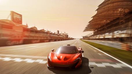 Dynamic McLaren P1 Racing on the Track in Stunning 4K Resolution wallpaper