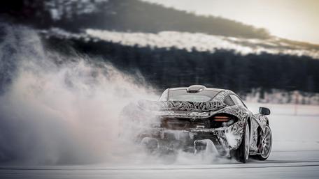 Mclaren P1 Powering Through Snow wallpaper