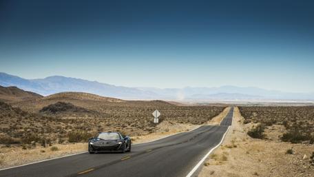 Sleek MCLAREN P1 on an Open Road wallpaper