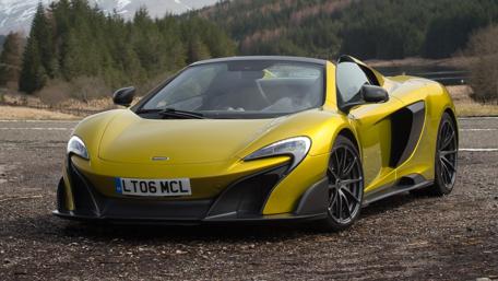 Sleek MCLAREN 675LT SPIDER in Striking Yellow wallpaper