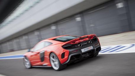 McLaren 675LT Racing in Motion Wallpaper wallpaper