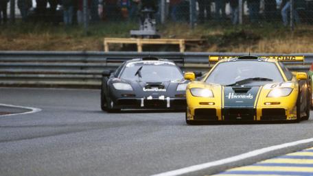 Racing Legends Unleashed in Motion wallpaper