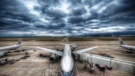 A Majestic View of Airport Aircraft at Dusk wallpaper