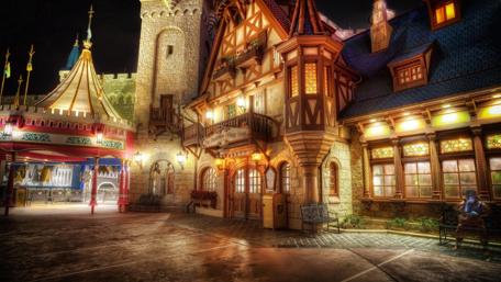 Charming Nighttime Cityscape with Historic Architecture wallpaper