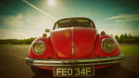 Vintage Red VW Beetle Glory wallpaper