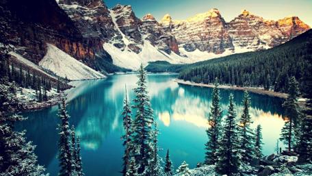 Snow-Capped Mountains and Serene Lake in Winter wallpaper