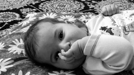 Adorable Baby in Black and White Wallpaper wallpaper