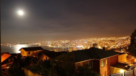 Stunning City Lights Under Moonlight wallpaper