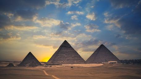 Majestic Pyramids Under a Colorful Sky wallpaper