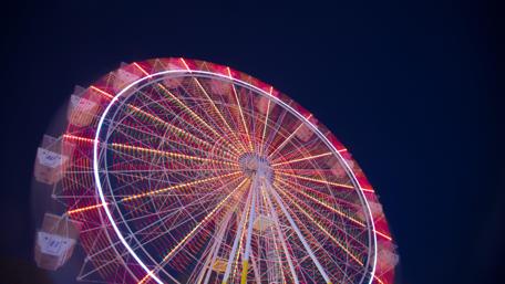 Colorful Ferris Wheel Illuminates the Night Sky wallpaper