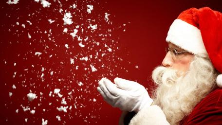 Joyful Santa Spreading Holiday Cheer wallpaper