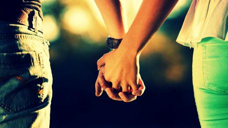 Joined Hands in Golden Sunset wallpaper