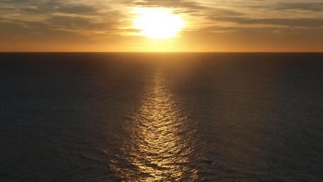 Golden Serenity Over the Water at Sunset wallpaper