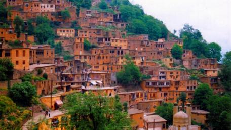 Charming Village Nestled in the Hills wallpaper