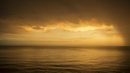 Serene Sunset Over Calm Waters wallpaper