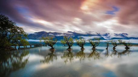Tranquil Reflections on a Serene Lake wallpaper