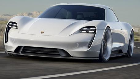 Sleek White Porsche on Open Road wallpaper
