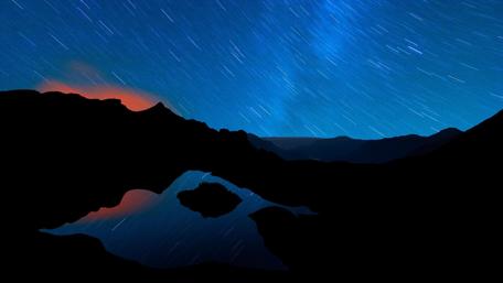 Celestial Reflections Under a Starry Night Sky wallpaper