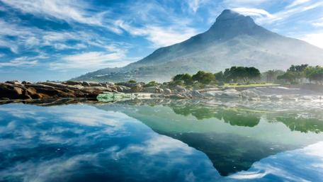 Serene Lake Reflection Under Majestic Mountain wallpaper