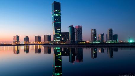 Stunning Dubai Skyline Reflected in Water at Dusk wallpaper