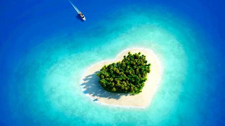 Heart-shaped Island Embraced by Tranquil Waters wallpaper