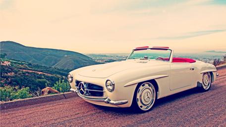 Classic Mercedes Roadster on Scenic Drive wallpaper