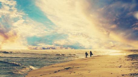 Sunset Stroll by the Ocean wallpaper
