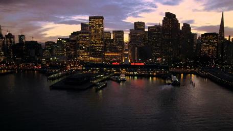 City Skyline at Dusk with Reflections in Water wallpaper