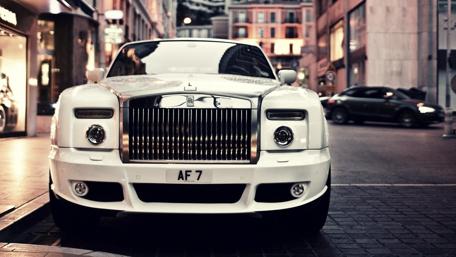 Luxury Car Glamour in Urban Streets wallpaper