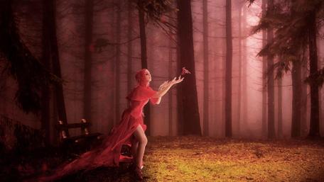 Mystical Red Woman in Enchanted Forest wallpaper