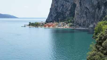 Tranquil Lakeside Village in Stunning Landscape wallpaper