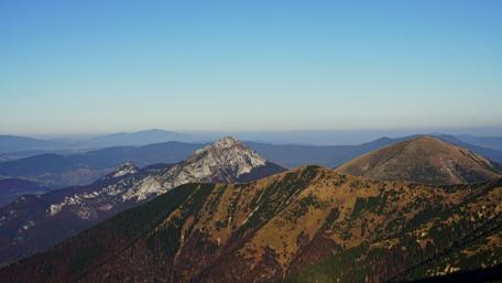 Majestic Mountain Ranges Under Clear Blue Sky wallpaper