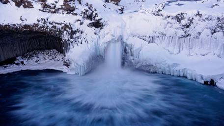 Frozen Winter Wonderland Waterfall wallpaper