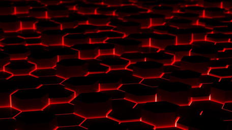 Dynamic Hexagonal Patterns in Red Light wallpaper
