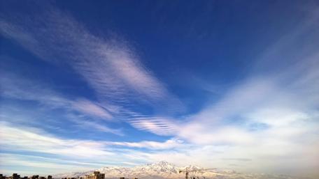 Majestic Mountains Under a Blue Sky wallpaper