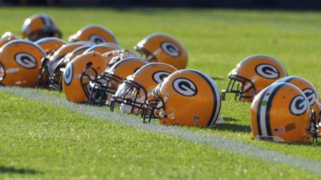 Green Bay Packers Helmets on the Field wallpaper