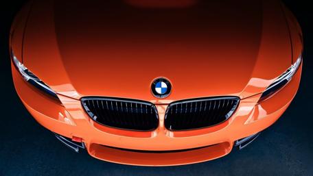 Vibrant BMW Excellence in Orange Shade wallpaper