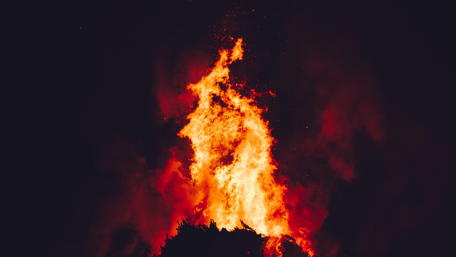 Fierce Flames Illuminate the Night Sky wallpaper