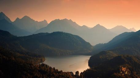 Majestic Castle Amidst Serene Nature Landscape wallpaper