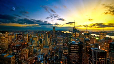 Majestic Cityscape at Sunset Overlooking City Lights wallpaper