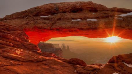 Golden Sunset through Rocky Arch wallpaper