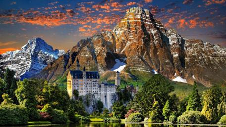 Castle Serenity Amid Majestic Mountains wallpaper