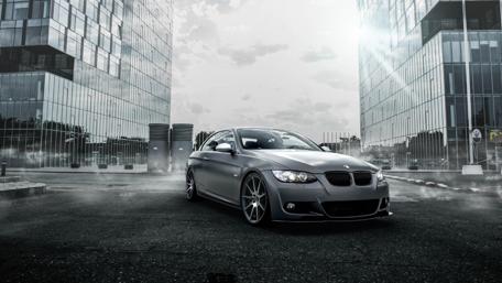 Sleek BMW in Urban Monochrome Scene wallpaper