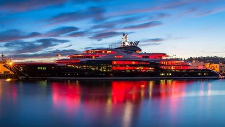 Luxurious Yacht at Dusk with Captivating Lights wallpaper