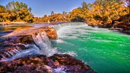 Majestic Forest Waterfall in Autumn Season wallpaper