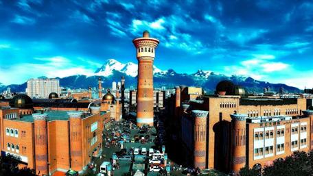 Majestic Urumqi Skyline Under Dramatic Clouds wallpaper