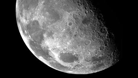 Moon's Majestic Craters and Shadowy Facets wallpaper