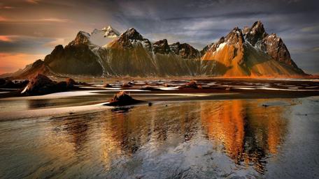 Rocky Mountains Mirrored in Tranquil Waters wallpaper