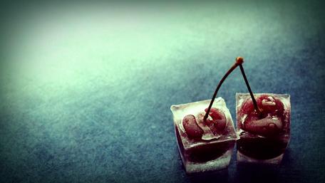 Chilled Cherries in Frosty Ice Cubes wallpaper