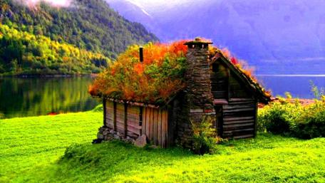 Rustic Lakeside Retreat Amidst the Mountains wallpaper